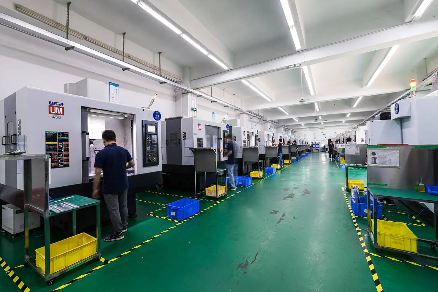 CNC workshop — lathes and machining centres running threading and precision bores
