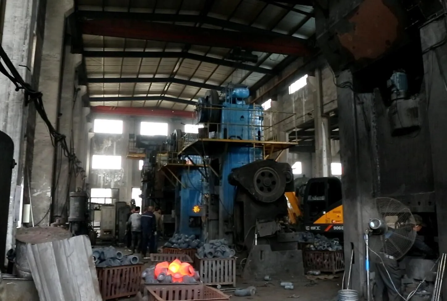 Forging line — hydraulic press forming elbows, tees and sockets