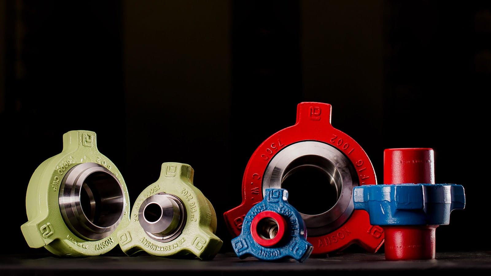 Group of hammer union fittings in several sizes, 1502 M×F crossover union, sour service