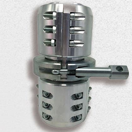 High-pressure male and female lay flat coupling joined, locking pin and clamps visible