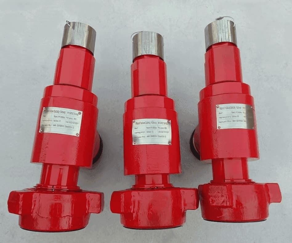 Three red spring-loaded pressure relief valves, 2 in × 1502 M×F, 10,000 psi sour