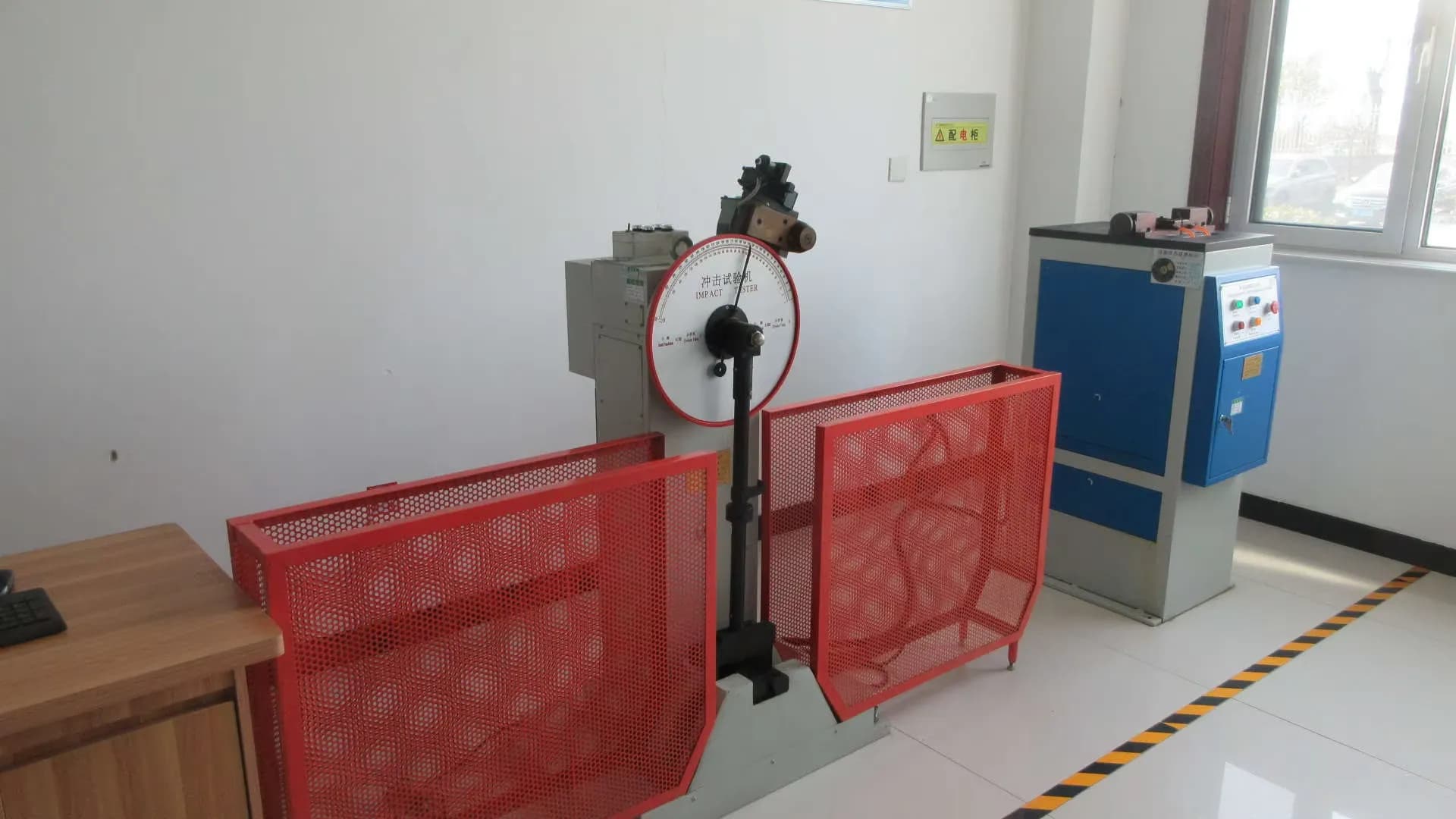 Pendulum impact tester in the mechanical testing laboratory
